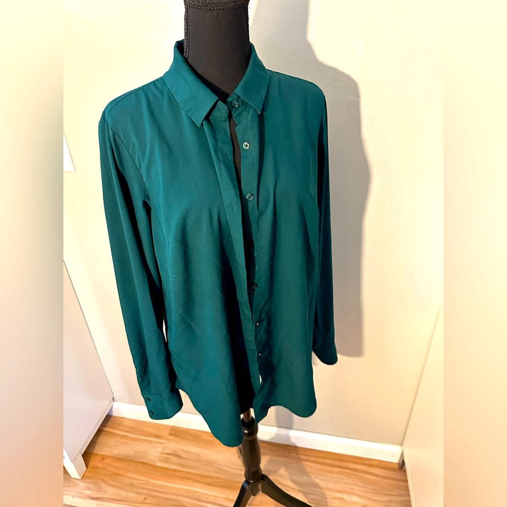 A NEW DAY. Basic green button up top with long sleeves.